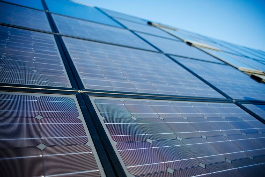 Solar panels installed on home roof vs traditional electricity, Long Island